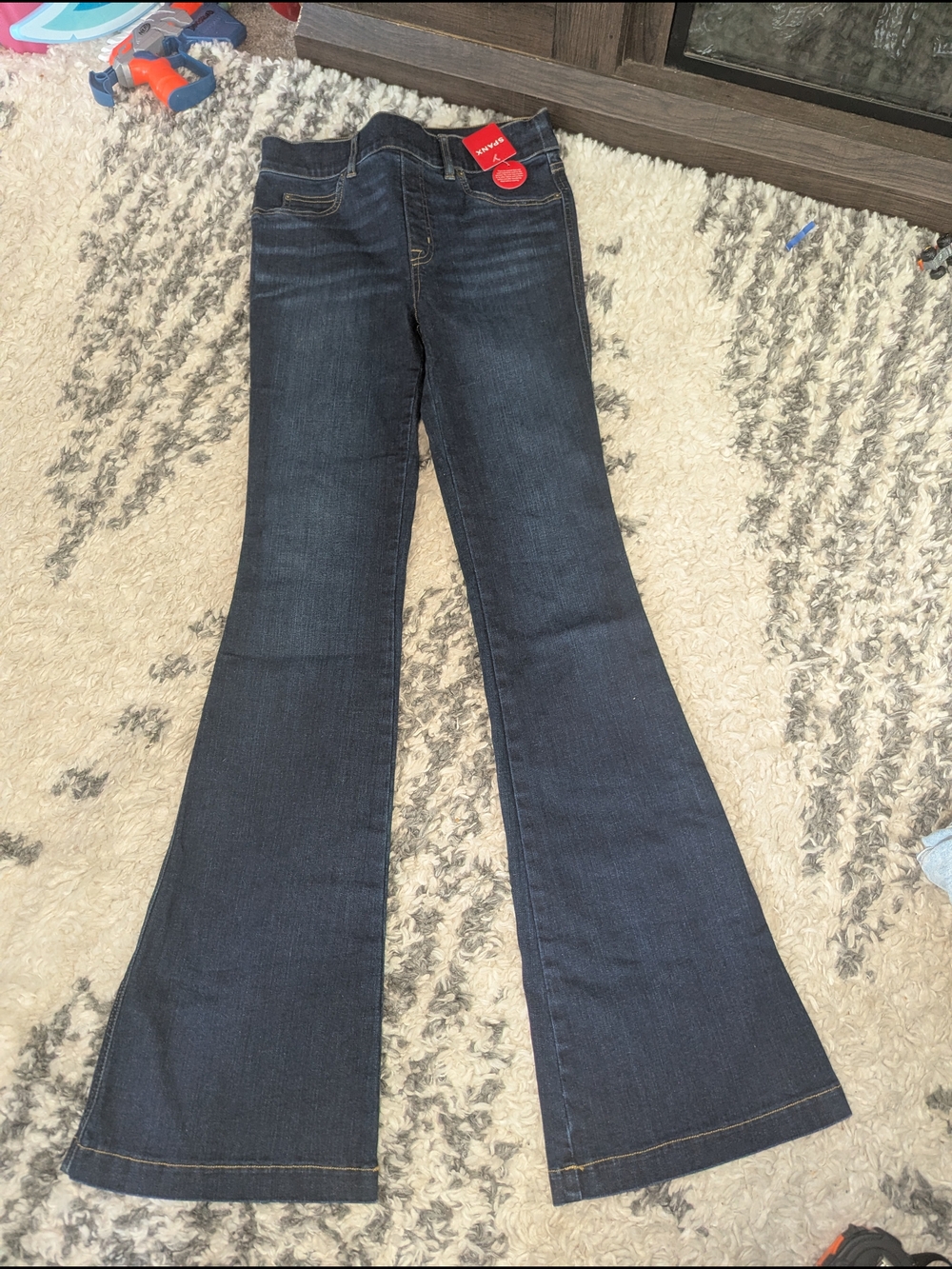 SPANX Dark Wash Flare Jeans in Deep Blue
